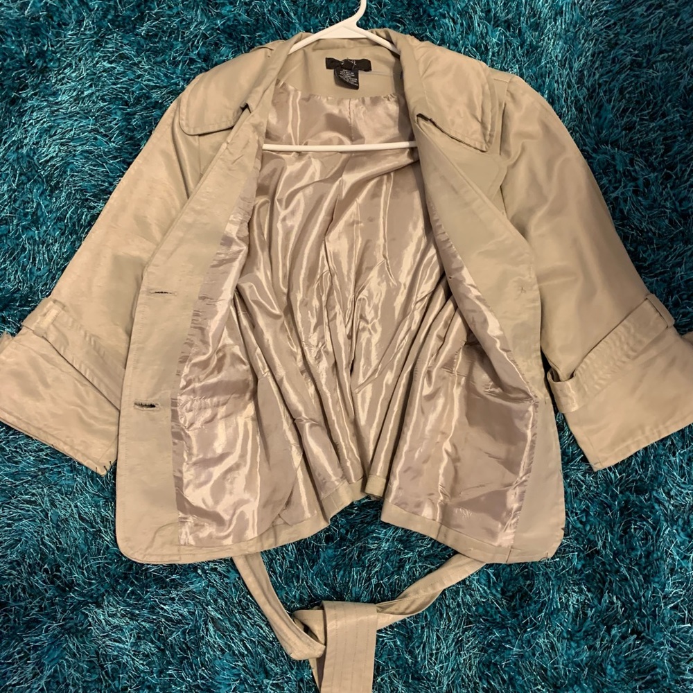 Light taupe or tan waist jacket. Very nice!